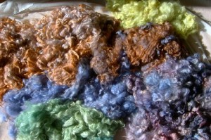 Rainbow dyed wool heaps