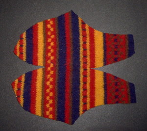Cut out slipper shape from felted sweater